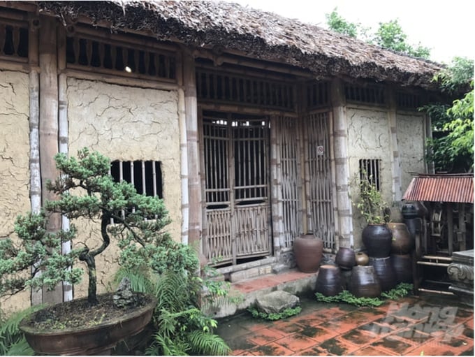 The bamboo-and-mud house is a familiar image from the rural villages of Northern Vietnam in the 1990s.