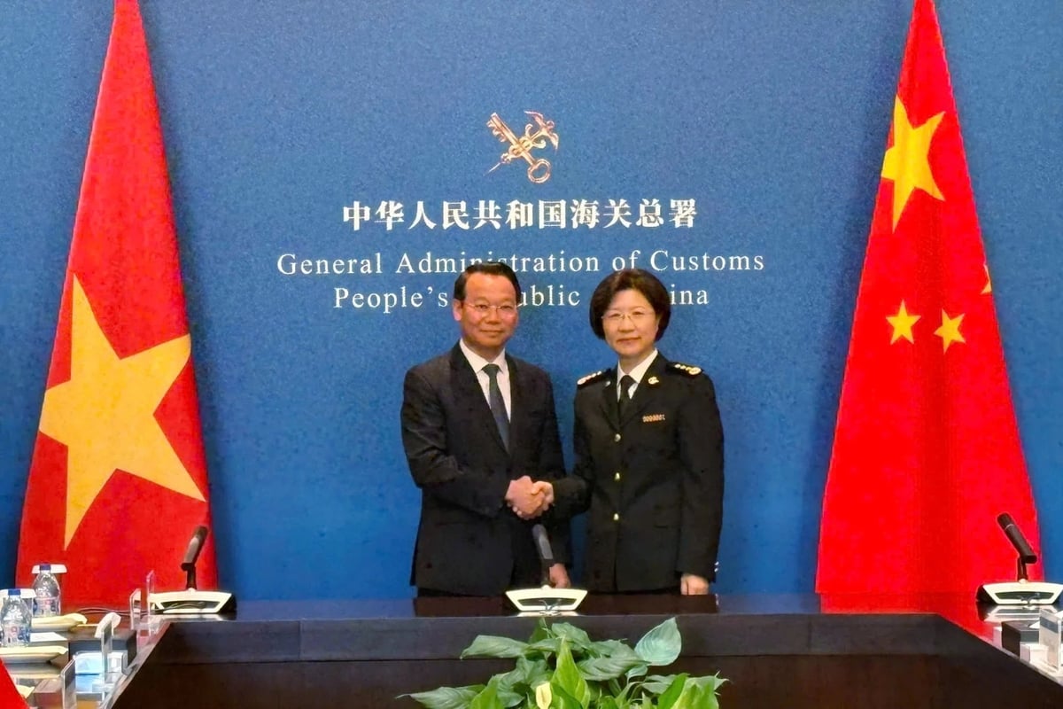 Minister Do Duc Duy and General Administrator Sun Haiqun agreed to promote cooperation in agricultural trade and market access. Photo: ICD.